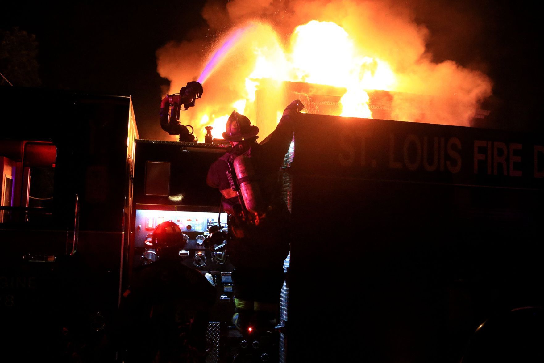 A St. Louis firefighters extinguish fire